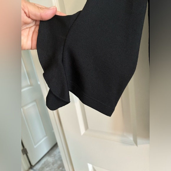 CLARA SUN WOO asymmetrical knit tunic top. Ruffle sleeve. Black,Like New. Large. - Picture 3 of 7